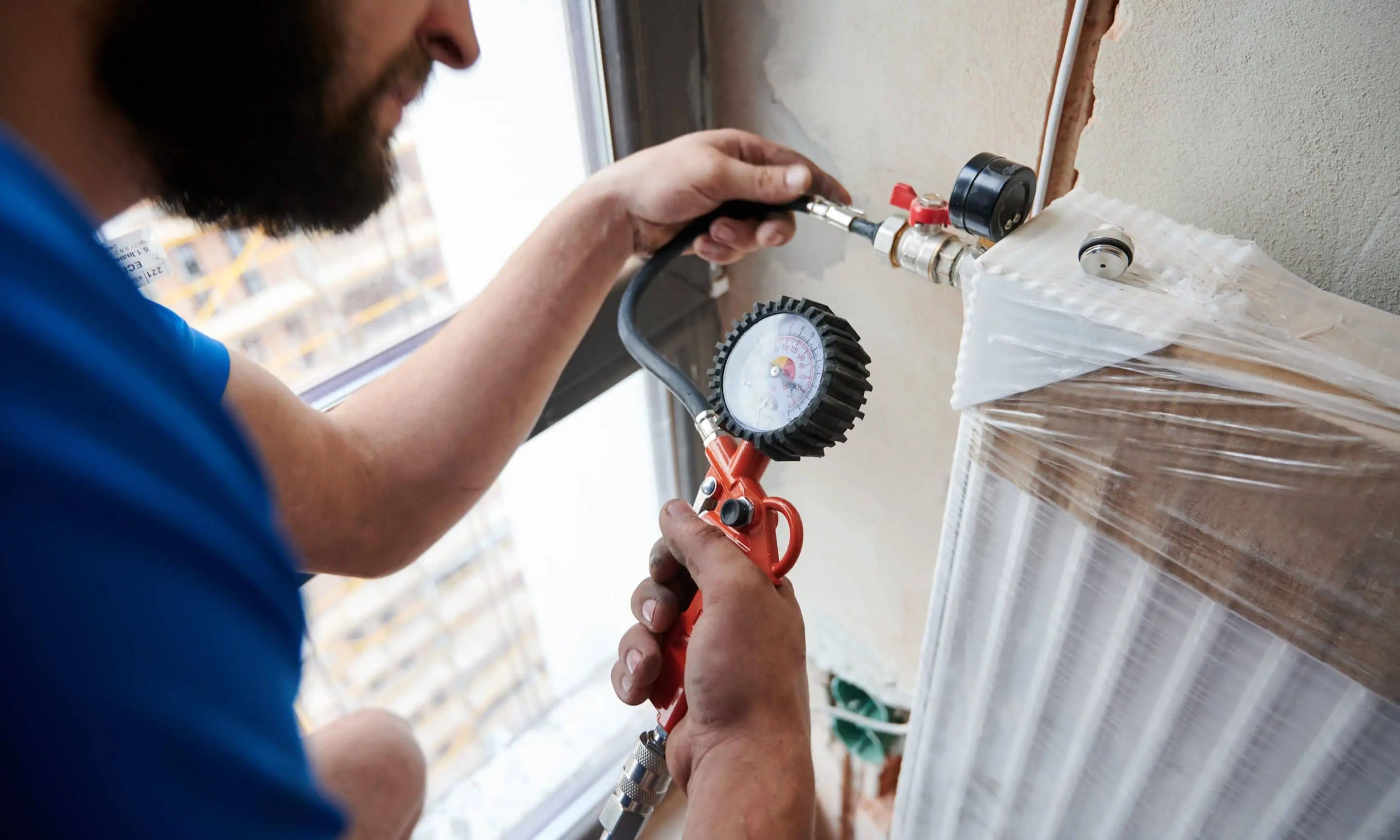 bigstock-Close-Up-Of-Plumber-Filling-Pi-417121483-min